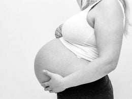 Woman Holding Her Baby Bump